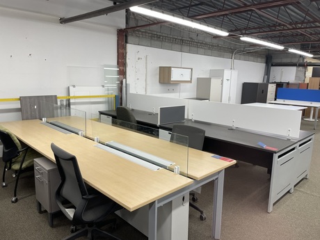 Photo of Multiple 4 space shared desks, vue 1, available at Oburo in Montreal
